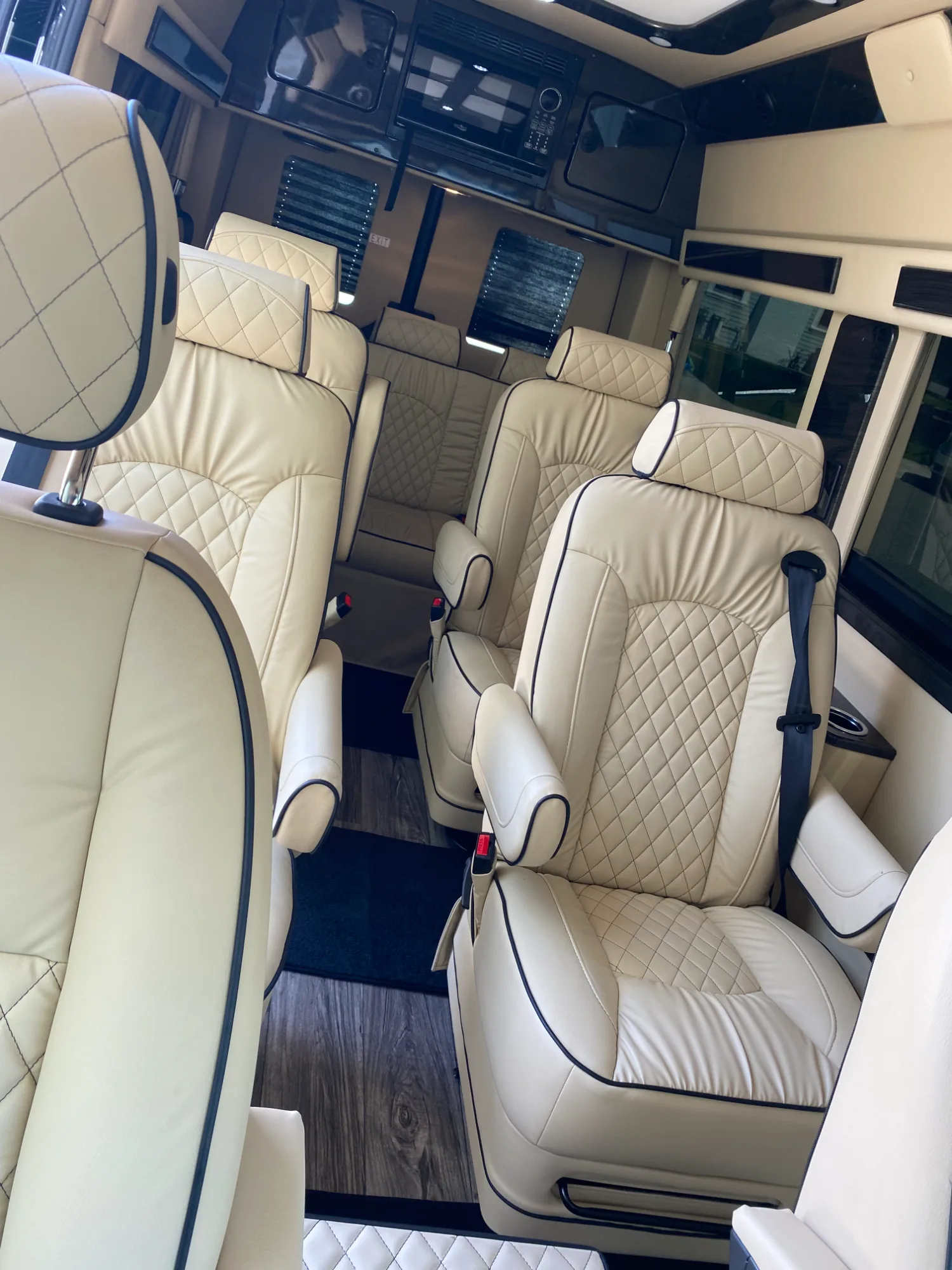Nine AMG swivel captain’s chairs in Sand leather.